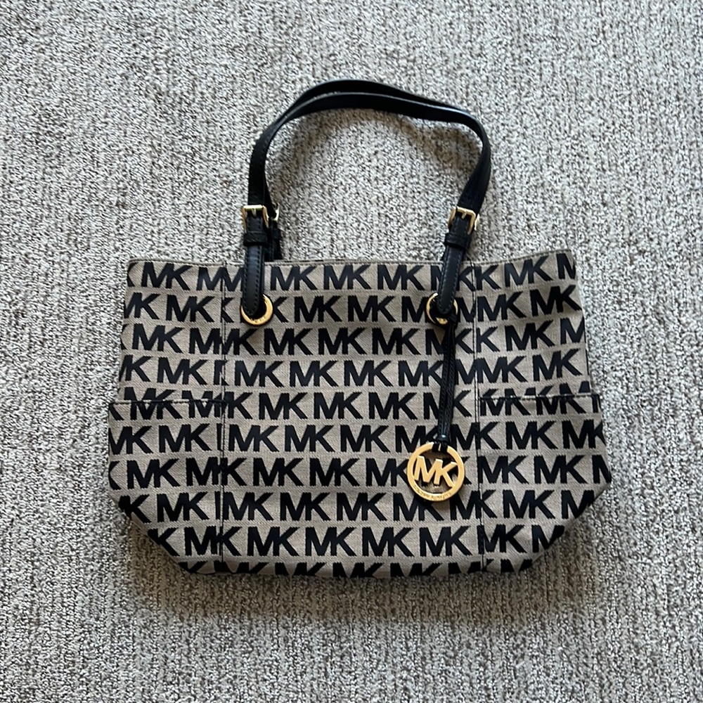 Michael Kors purse, black and tan color. Gently used.